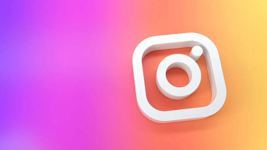 A colorful background showcasing the Instagram logo, featuring reels functionality.