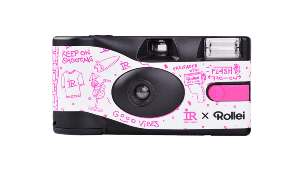 A disposable camera with doodles on it.