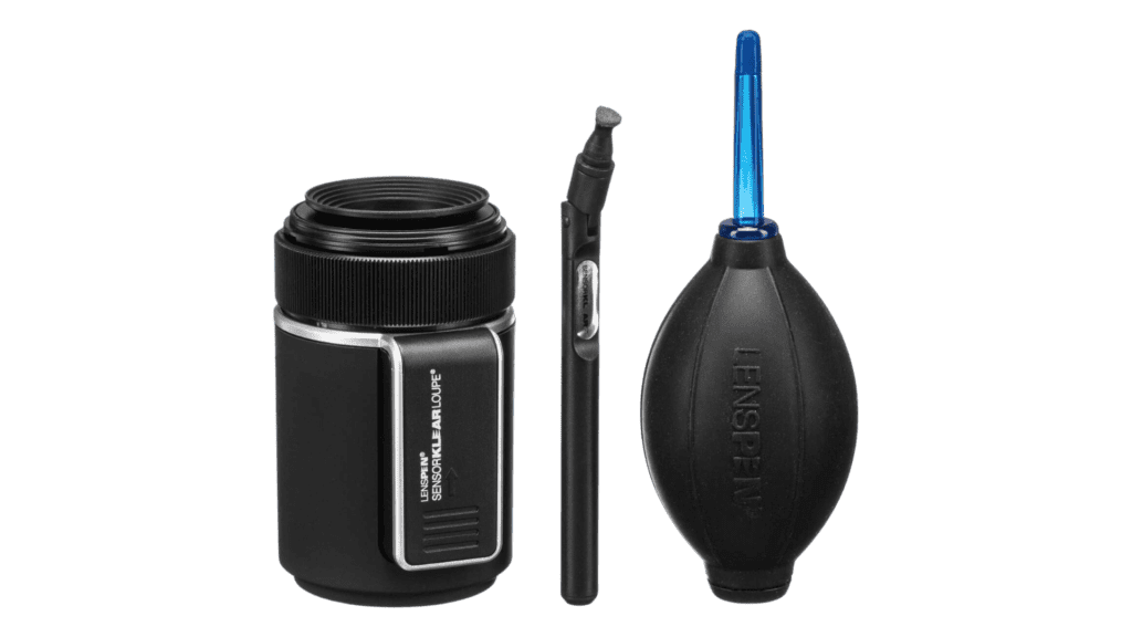 A black bottle with a blue brush, ideal for Camera Lens Cleaning Kits.