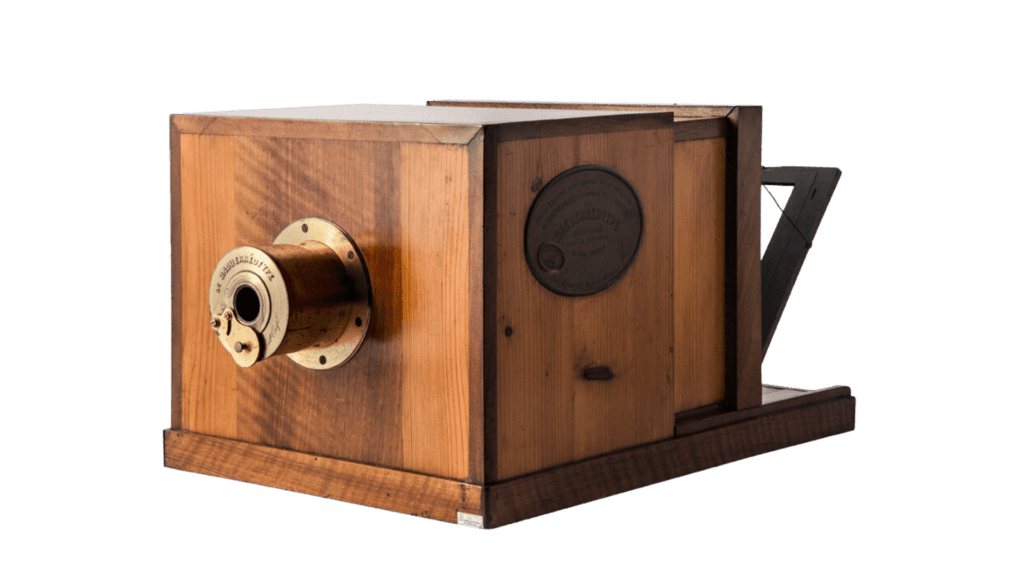 A wooden camera, handle.