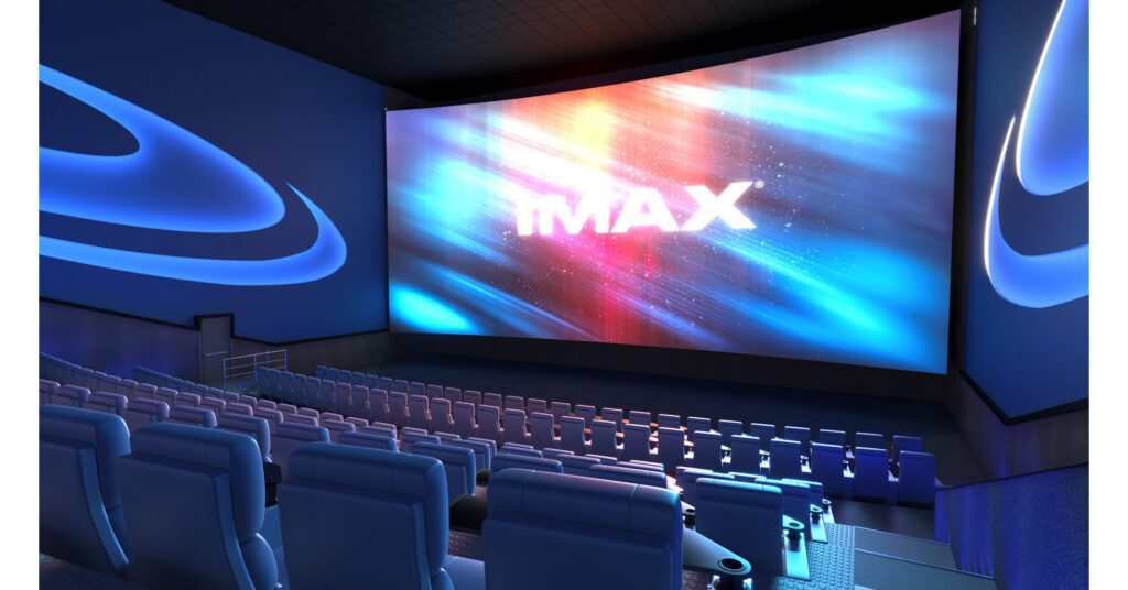 A movie theater with the word imax on the screen, featuring Cinemark XD technology.