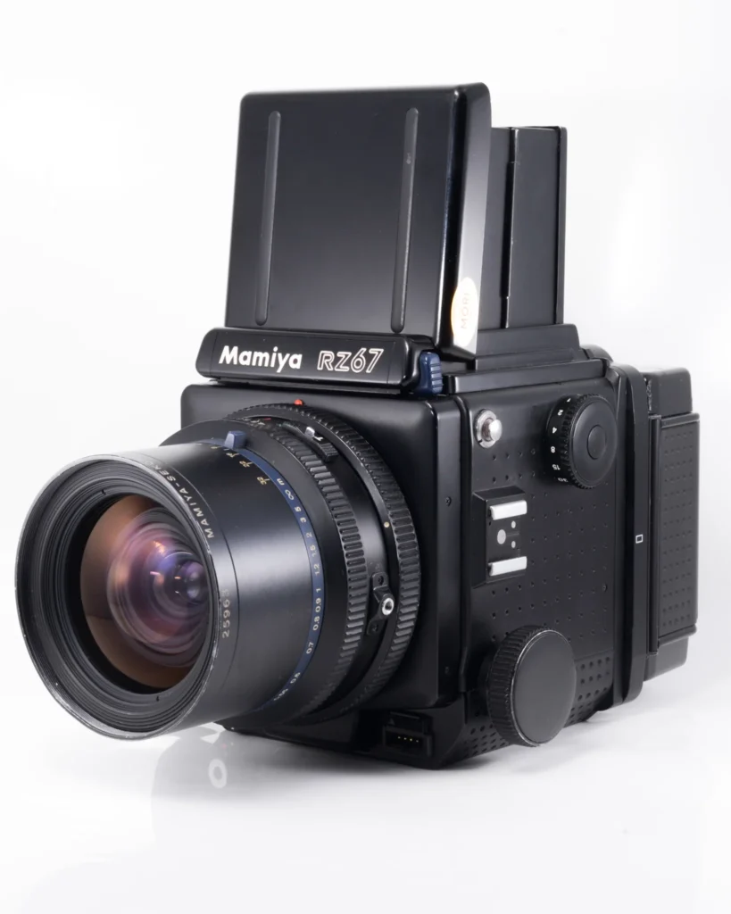 A black Mamiya RZ67 camera with a lens attached to it.