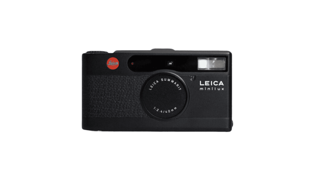 A black camera with a red lens, ideal for film photography.