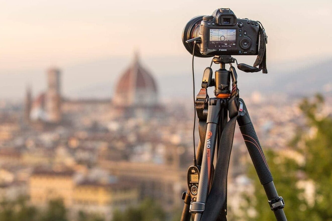 How Many Legs Does a Tripod Have in front of a city.