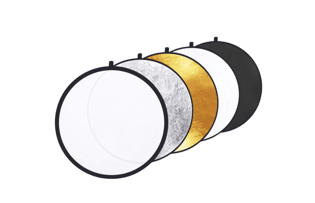 Five collapsible photography reflectors, ideal for flower photography, in white, silver, gold, black, and translucent colors, arranged side by side.