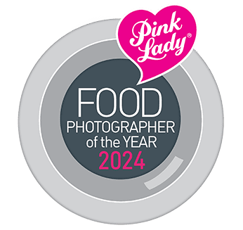 Logo of the pink lady food photographer of the year 2024 award.