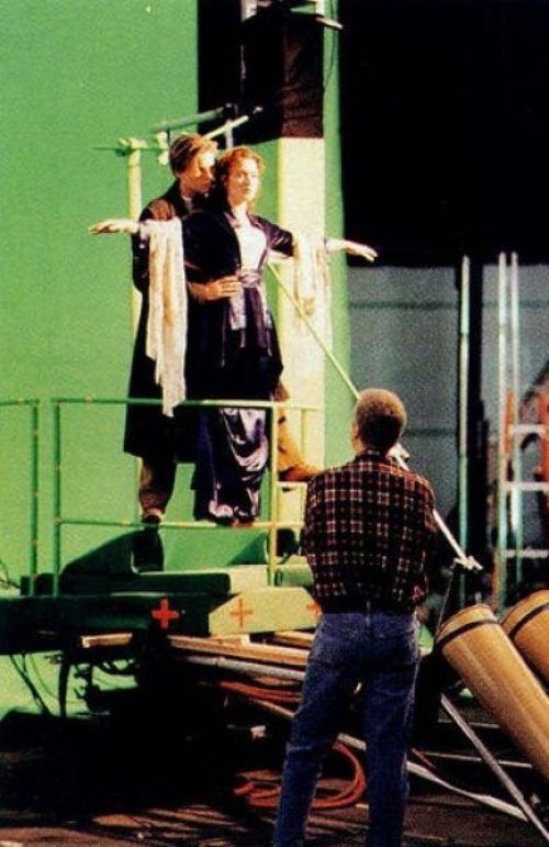 Actors simulate a scene on a platform in front of a green screen, where crew members assist in crafting the magic that CGI—Computer-Generated Imagery—brings to life.